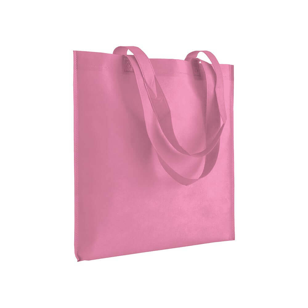 pink color non woven bag with long handles